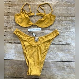 NWT MHB START ME UP UNDERWIRE TOP AND U BOTTOMS IN YELLOW SUEDED